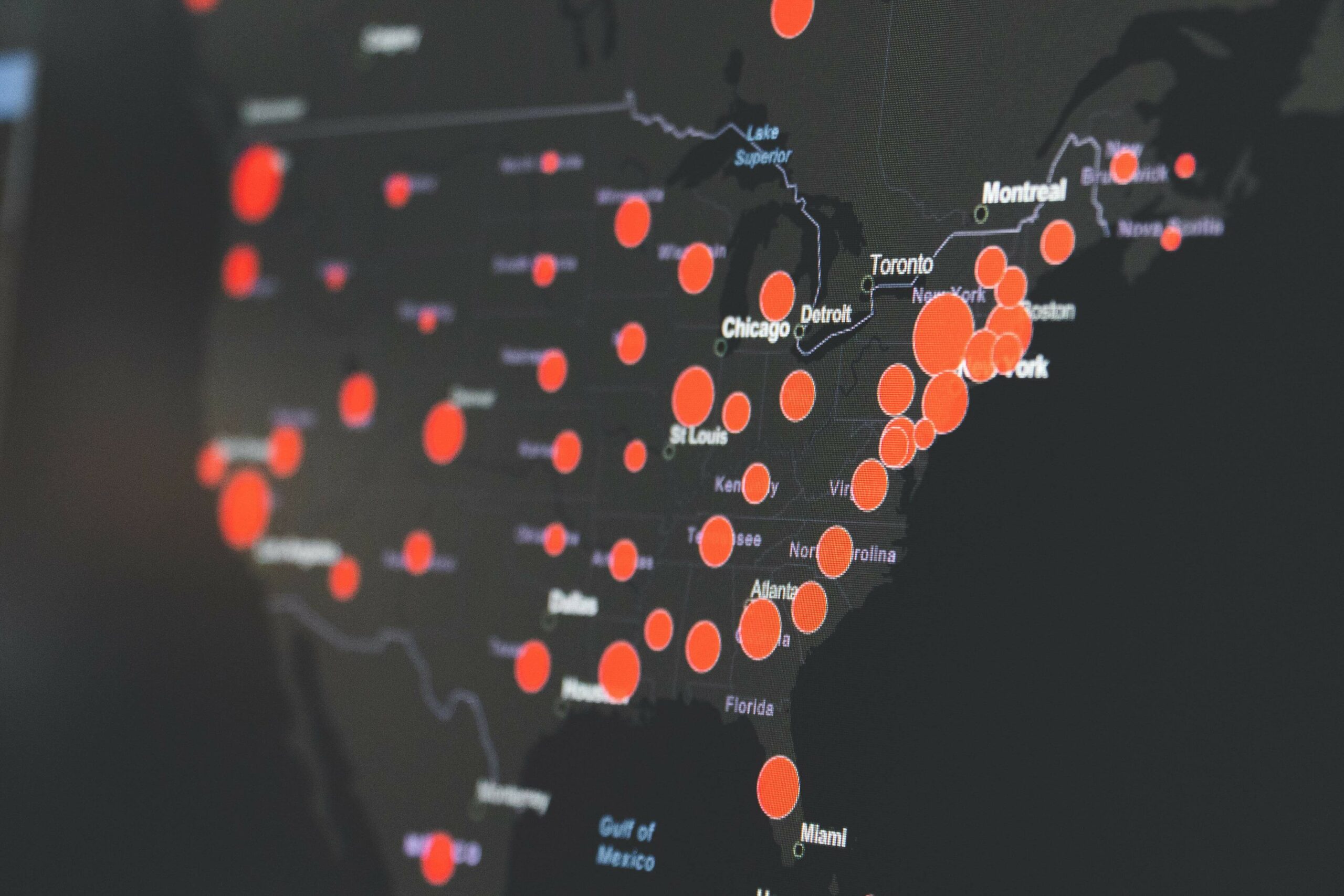 A black USA map with red spot locations