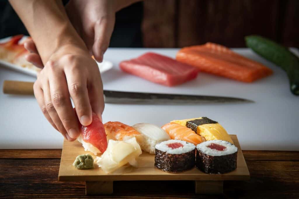 A person making sushi