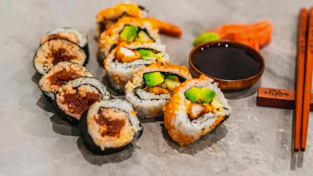 A plate with makizushi and soy sauce