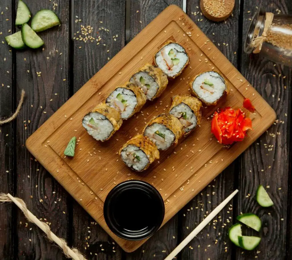 Fried sushi on a wooden board