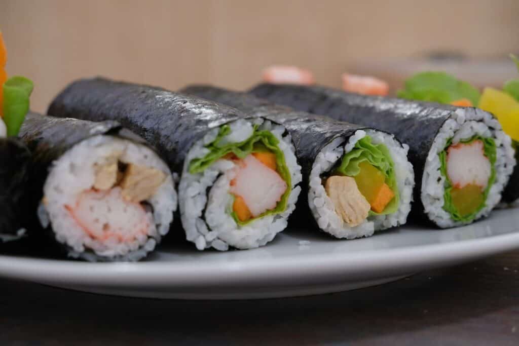 A few different maki rolls plated together