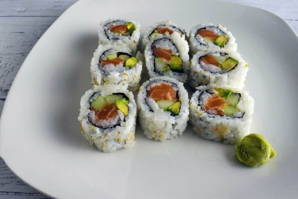 Sushi roll on a white plate