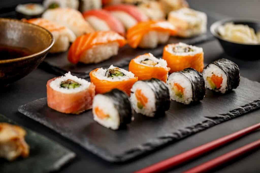 Sushi rolls on a board 