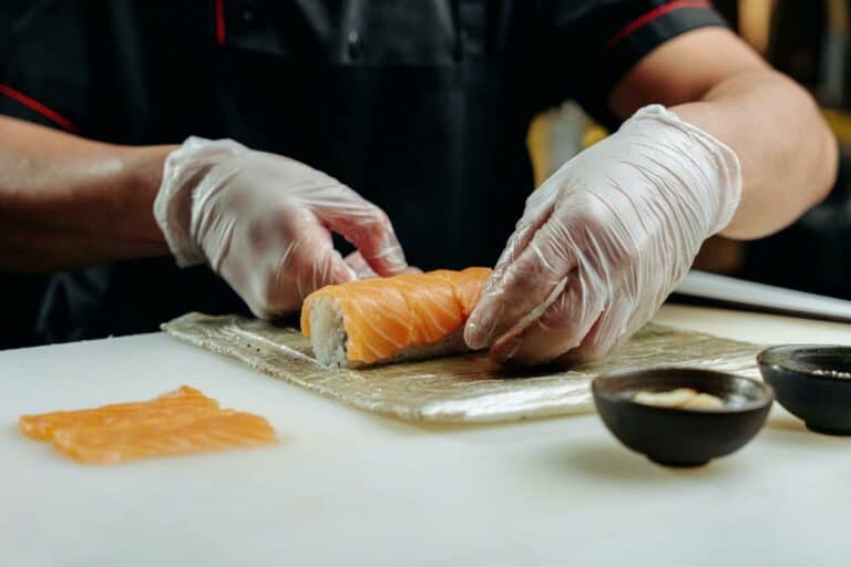 A sushi chef making a delicious sushi roll