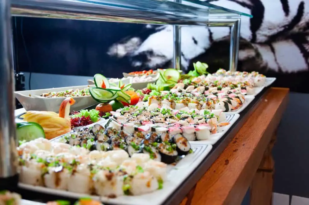 A table with a variety of sushi