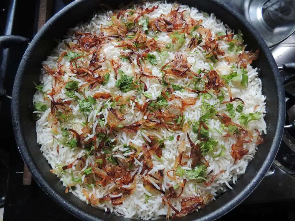A pan of biryani similar to a sushi bake