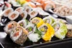 Different types of maki rolls on platters