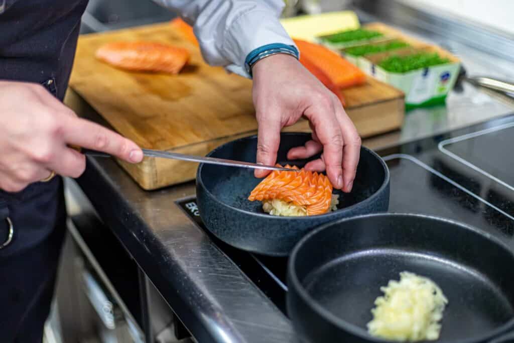 Chef serving sashimi