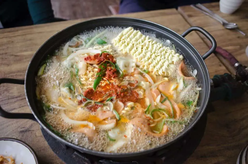 Seasoned noodle dish boiling in a pan