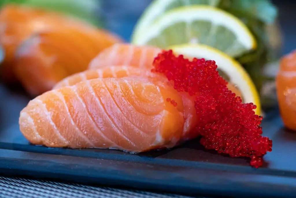 A small slice of salmon sashimi