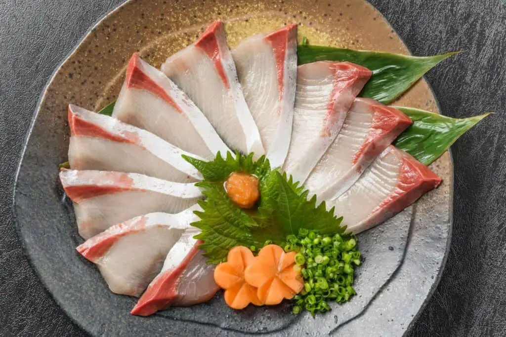 A plate with yellowtail sashimi