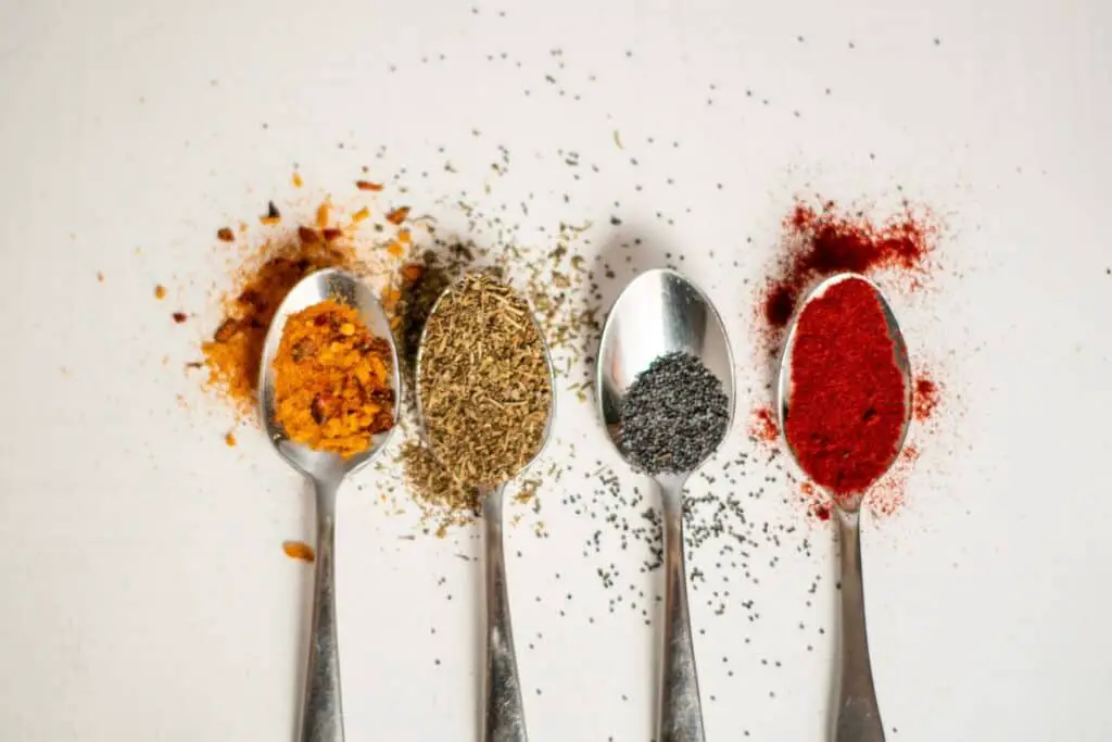 Spoons filled with spices