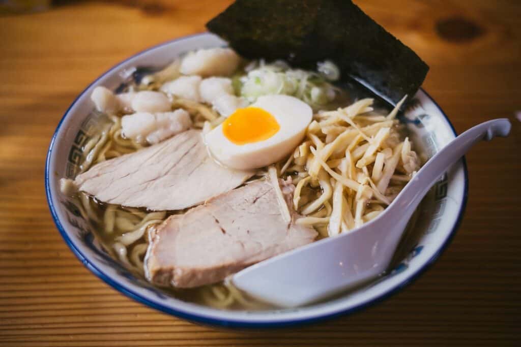 Ramen with eggs and meat in a bowl