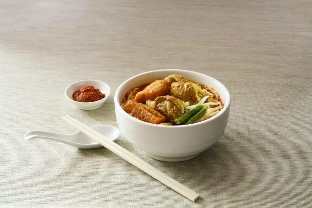  Ramen in a bowl served with chopsticks