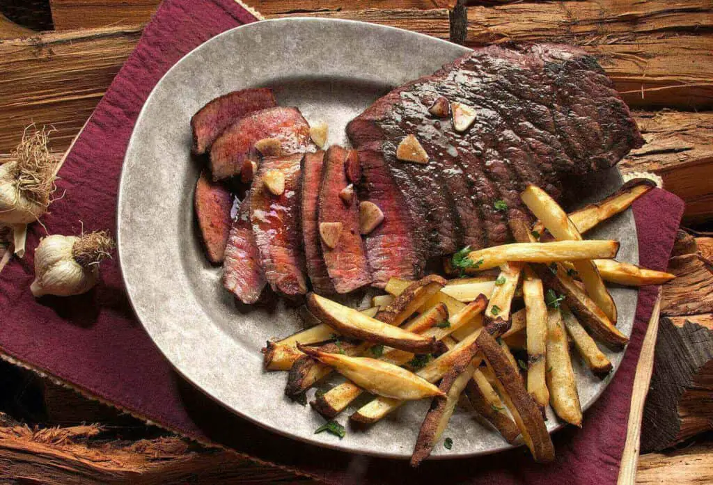 A cut steak on a plate